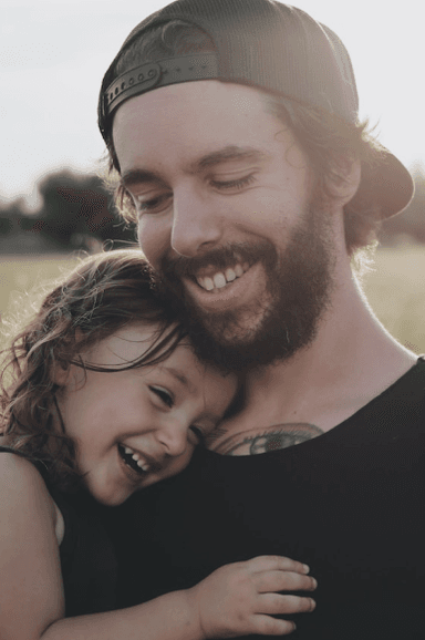 Father and daughter laughing together
