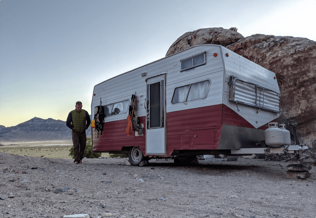 Red/white vintage trailer with climbing gear
